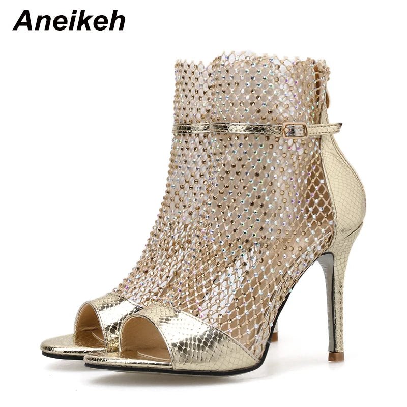 Botas peep-toe de festa Anei keh em dourado com detalhes brilhantes e salto alto elegante