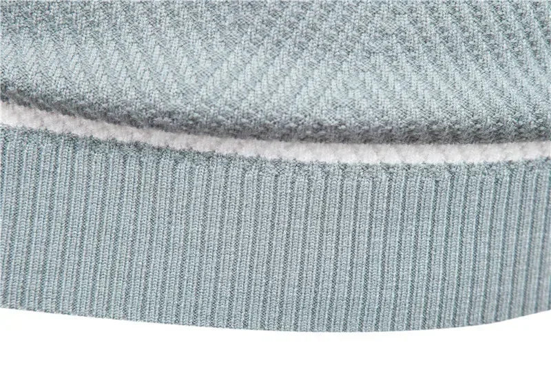 Detalhe do casaco suéter masculino quente LONSDALE na cor verde, com acabamento em ribana.