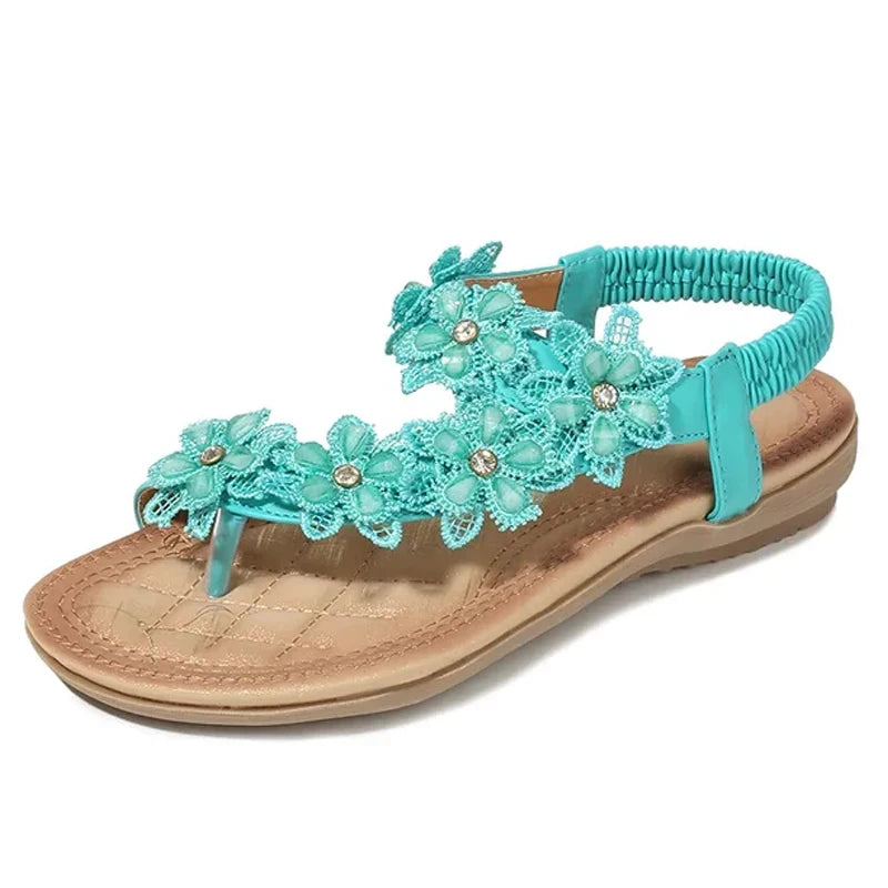 Sandálias femininas com flores em azul turquesa com detalhes em strass e sola confortável
