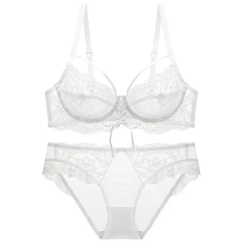 Conjunto lingerie decote profundo em renda branca com sutiã e calcinha feminina delicados