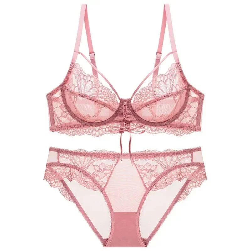 Conjunto lingerie decote profundo em renda rosa com sutiã e calcinha para um visual elegante e sensual