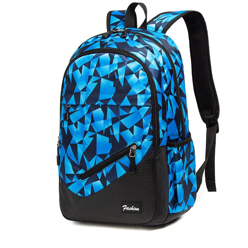 Mochila escolar grande capacidade em azul com design geométrico moderno e alças ajustáveis