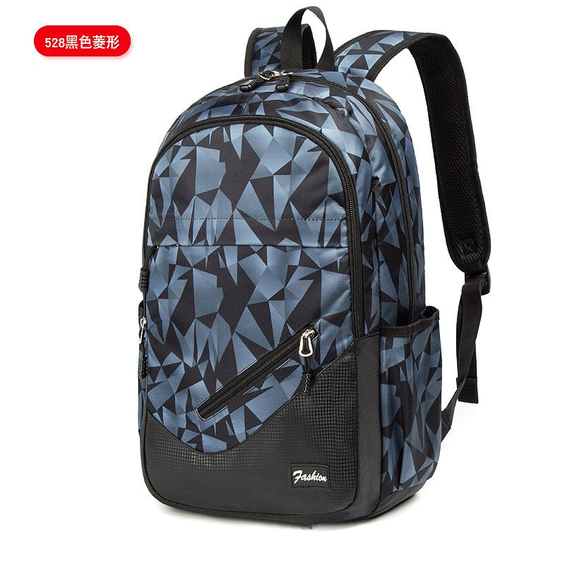 Mochila escolar grande capacidade com padrão geométrico azul e bolsos laterais para crianças