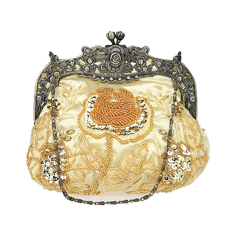 Bolsa feminina vintage da HISUELY em tom creme com bordados em flor e corrente elegante