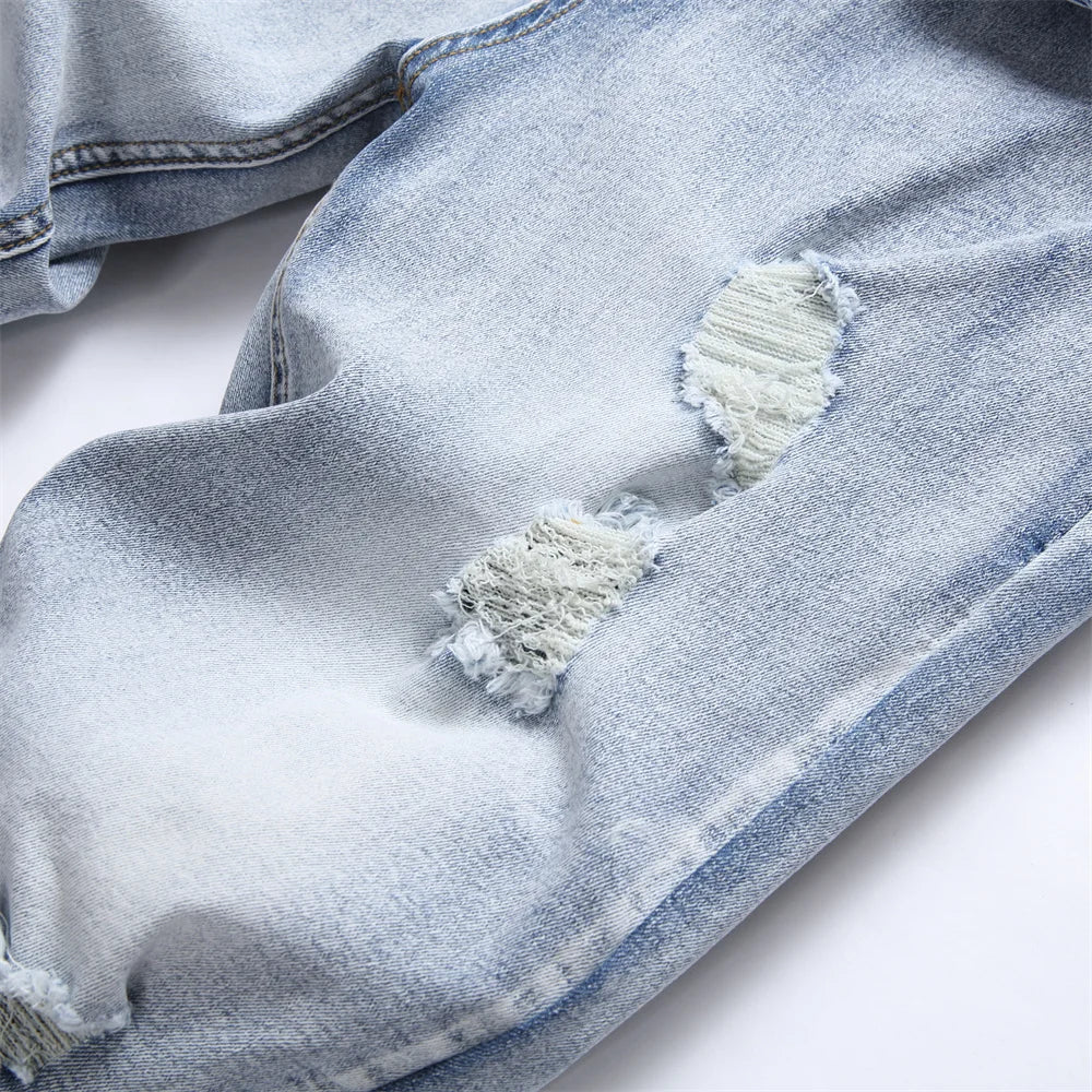 Calça jeans hip hop masculino com rasgos e desbotamento em estilo moderno