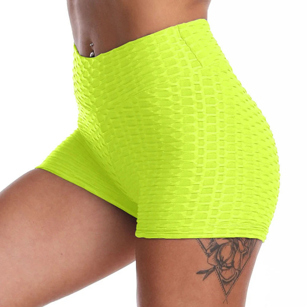 Shorts feminino de ioga FLCPAY em neon com design confortável e tecido elástico para praticar exercícios