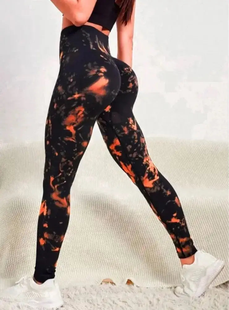 Calça feminina TIANKA legging cintura alta sem costura em estampa tie dye laranja e preta