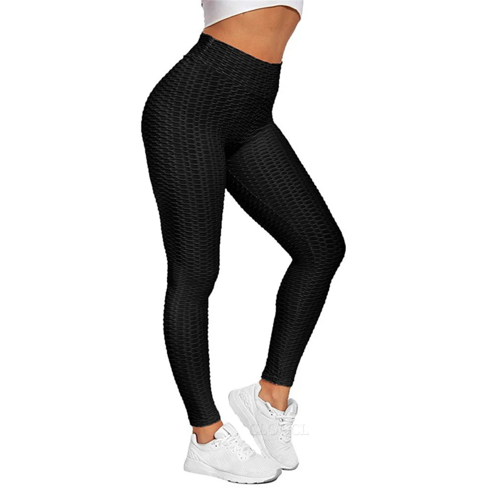 Calça feminina legging push up treino preta com design texturizado e cintura alta