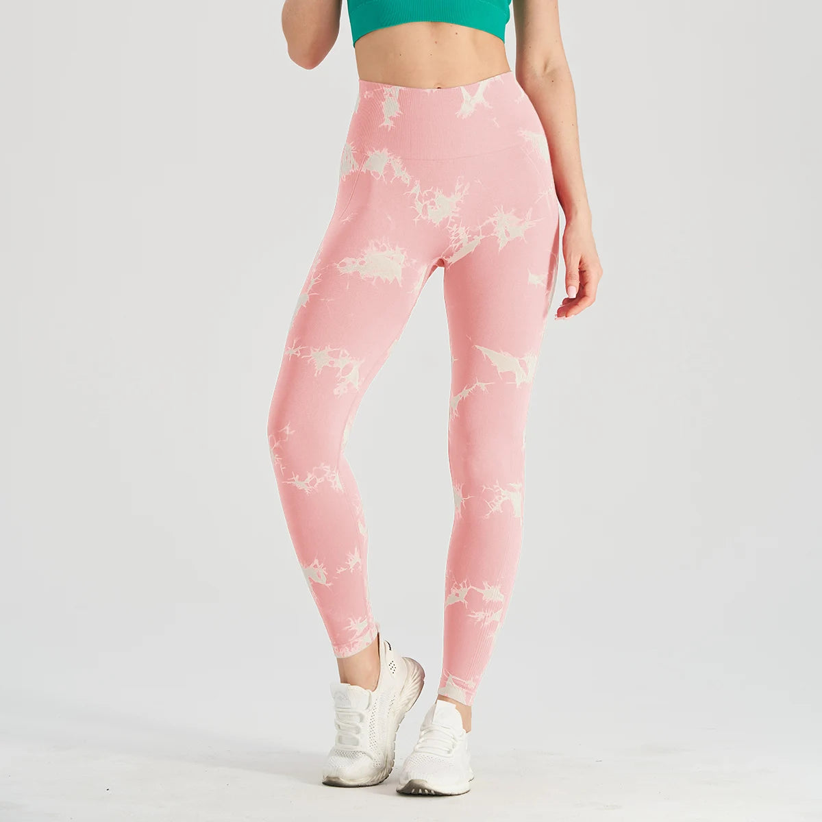 Calça feminina leggings femininas tie dye em rosa com estampa suave e ajuste confortável