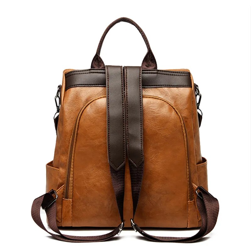 Mochila feminina anti-roubo YOGODLNS em couro marrom com alças e bolso lateral