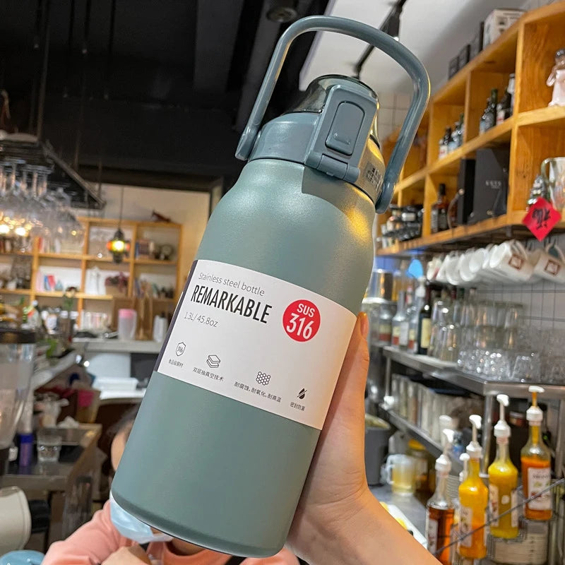 Garrafa térmica MODUS em aço inoxidável, ideal como Vacuum Flask para Camping, em cor verde
