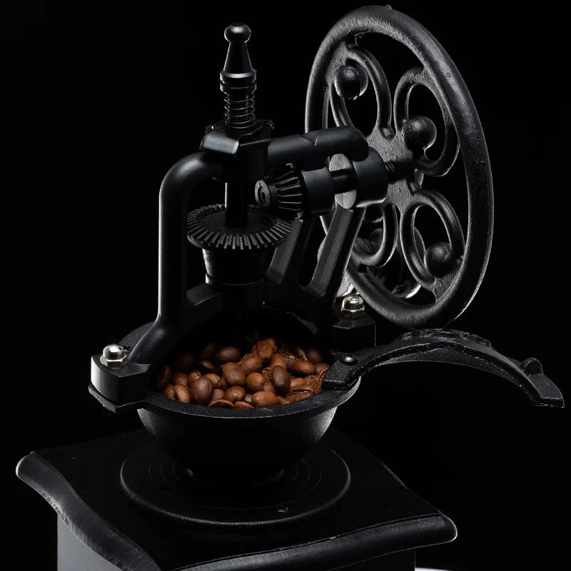 Moedor de café manual retrô da GIANXI em metal com design clássico e grãos de café no compartimento
