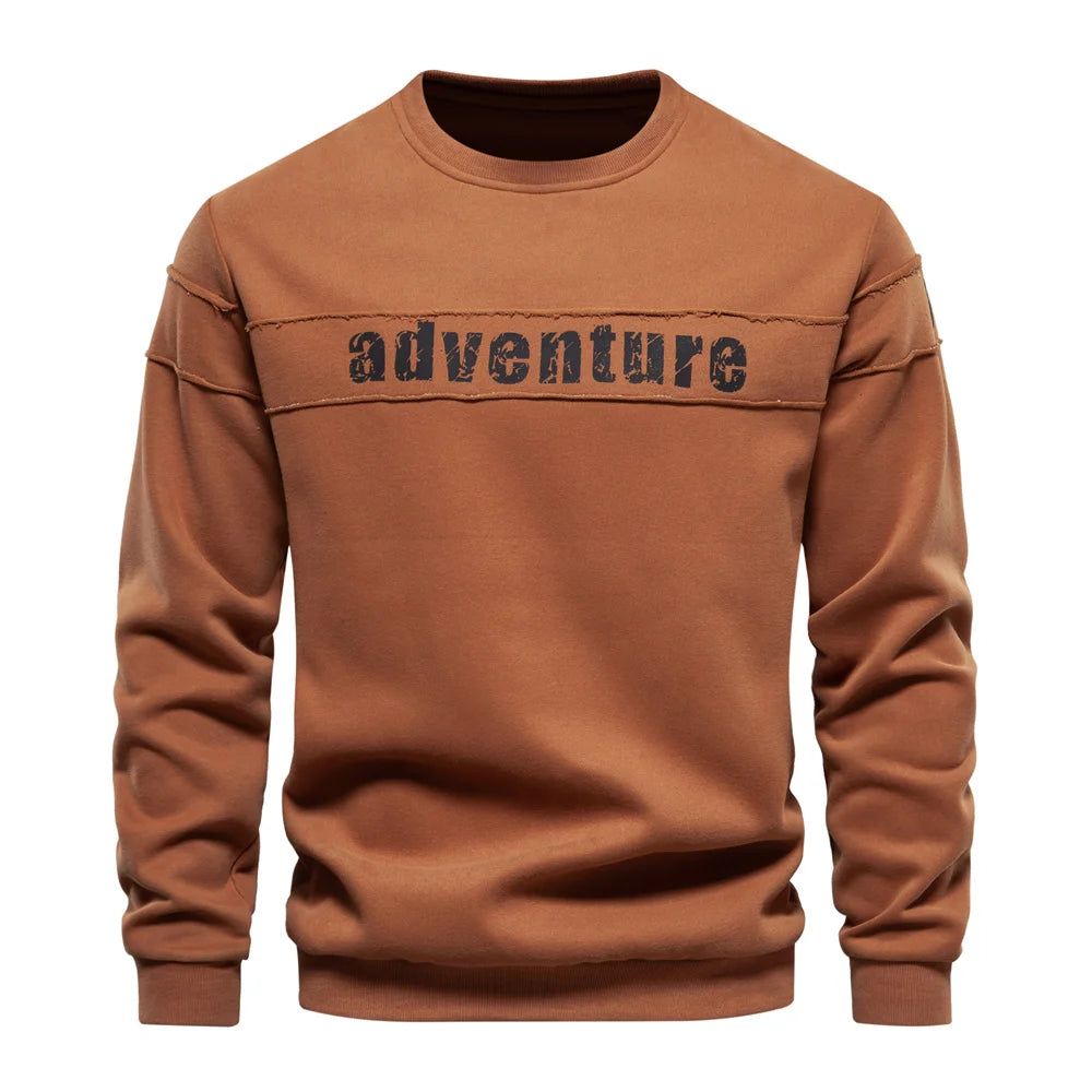 Suéter masculino da AIOPESON em tom caramelo com estampa 'adventure', ideal como moletom estampado para homens.