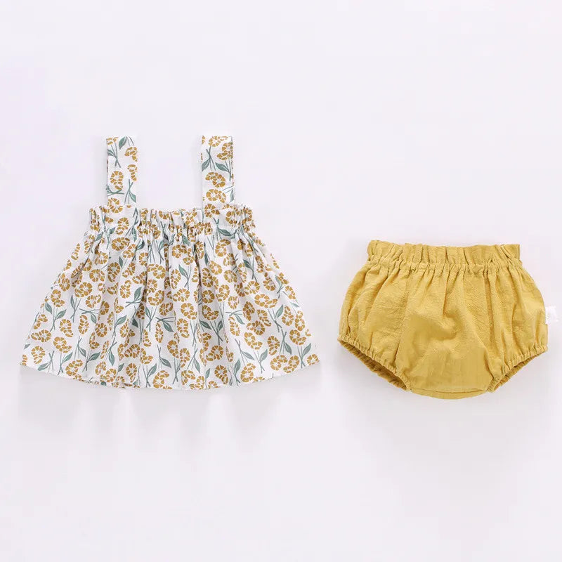 Conjunto de roupas infantis estampadas para recém-nascidos com blusa floral e short amarelo