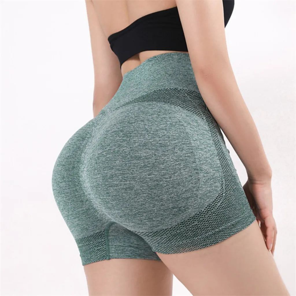 Shorts de cintura alta feminino com modelagem ajustada e detalhe em malha para conforto durante os treinos
