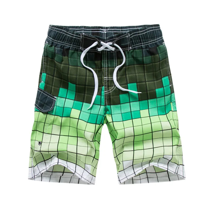 Shorts de praia masculina plus size em estampas verde com bolso lateral e cordão ajustável
