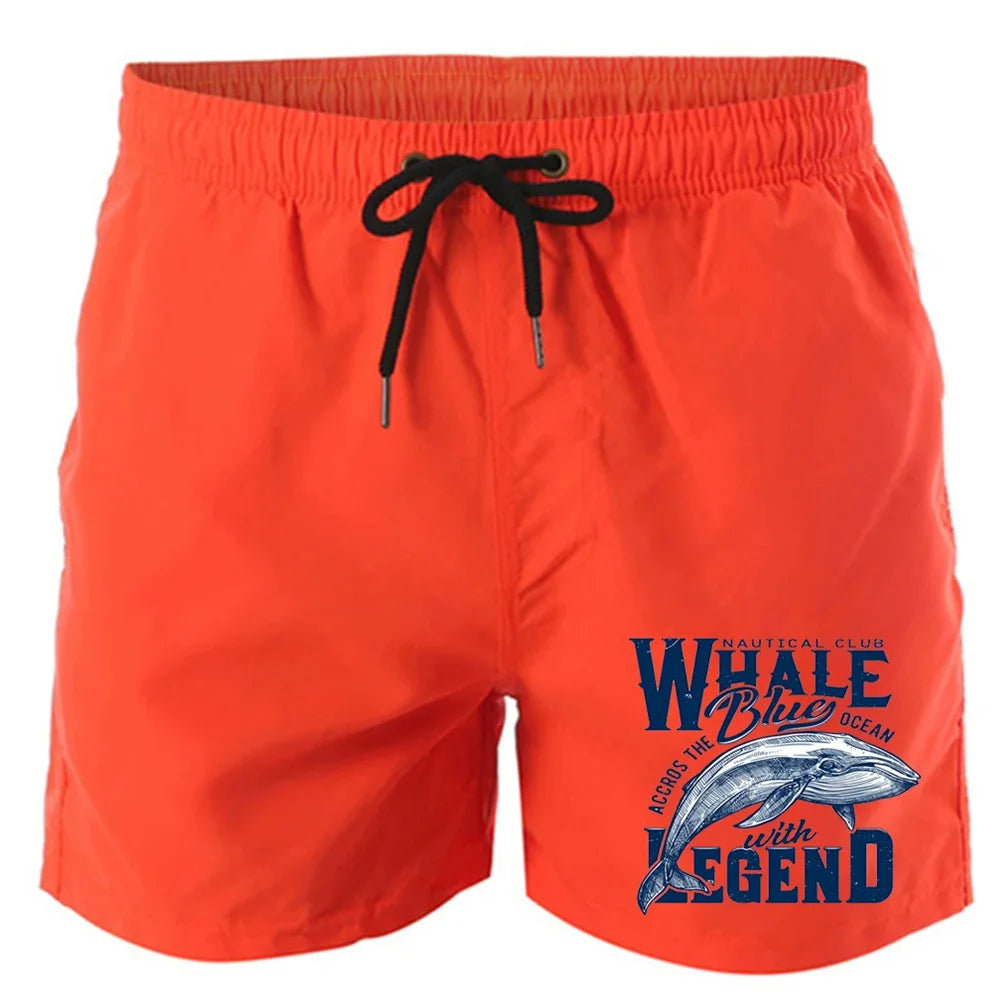 Shorts estampados de baleia em laranja com estampa náutica e cordão ajustável