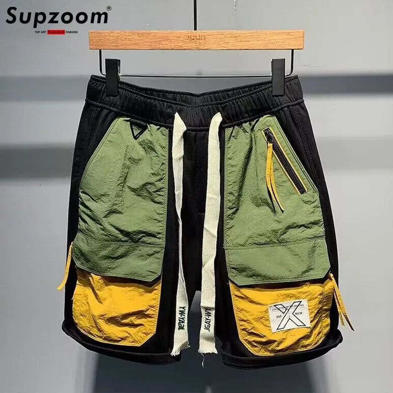 Shorts masculino streetwear da SUPZOOM com bolsos grandes e design moderno em preto, verde e amarelo