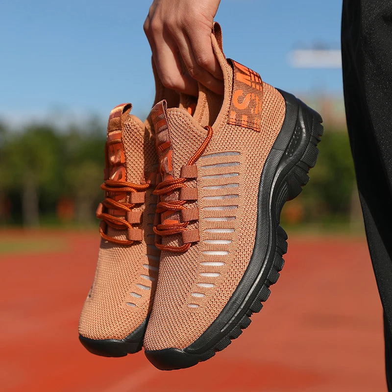 Tênis de corrida masculino confortável da ZULIWAGN em tom laranja, ideal para treinos ao ar livre