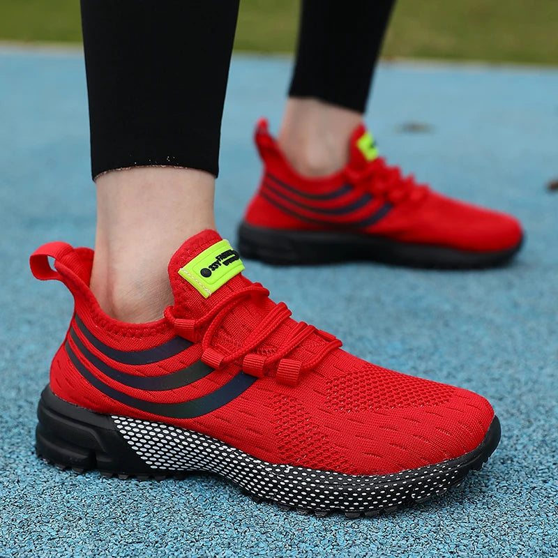 Tênis Esportivo Malha Respirável com Almofada em vermelho, ideal para atividades ao ar livre e conforto diário