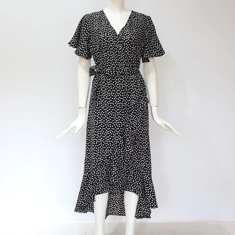 Vestido maxi floral feminino da marca DOZW, com estampa preta e branca e mangas bufantes
