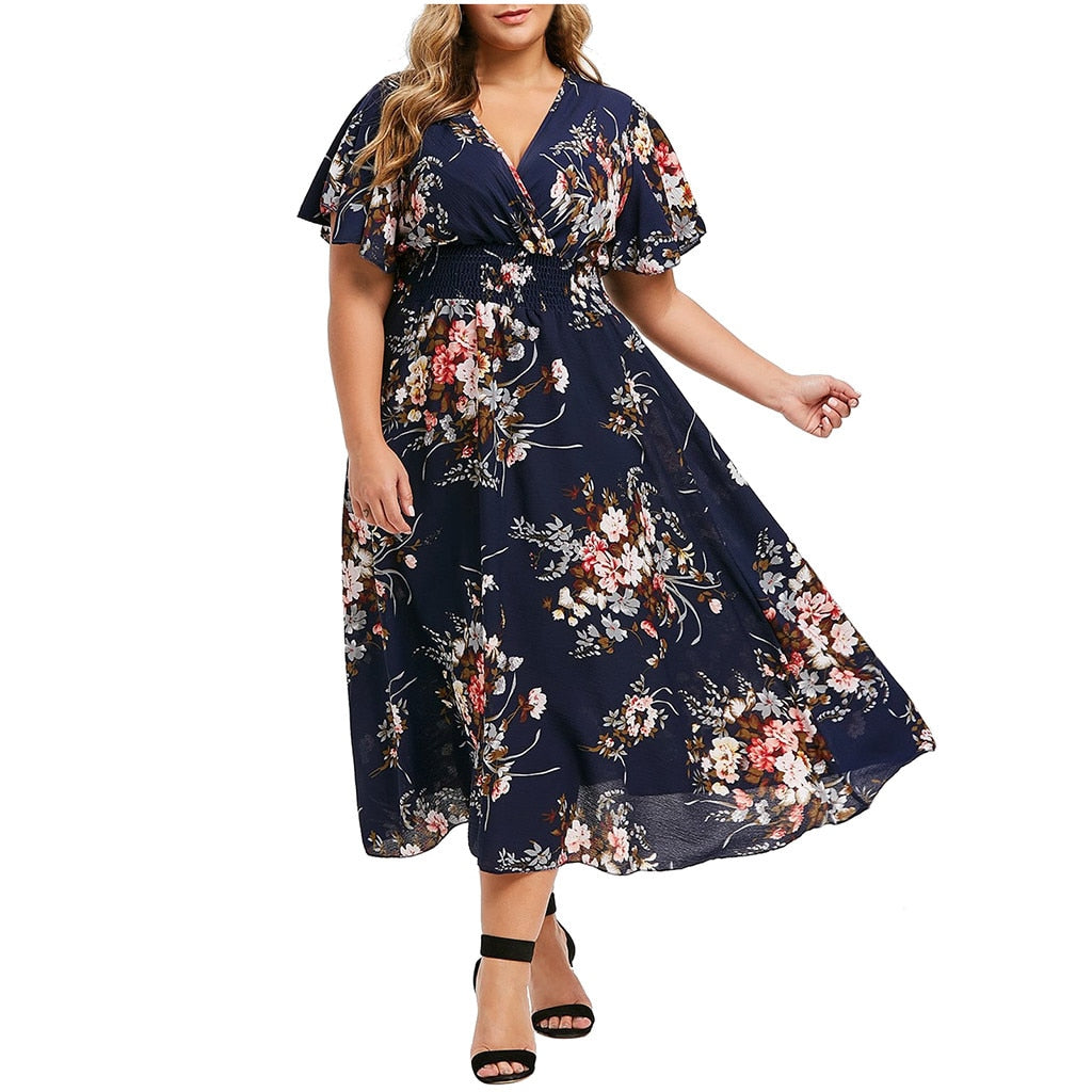 Vestido plus size floral da ROSIELARS com mangas bufantes e estampa elegante em fundo azul marinho