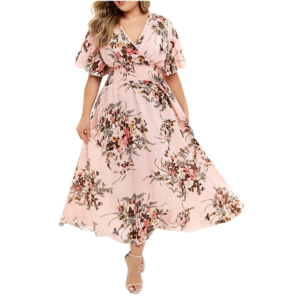 Vestido plus size floral da ROSIELARS em tom rosa com estampa de flores vibrantes e manga bufante