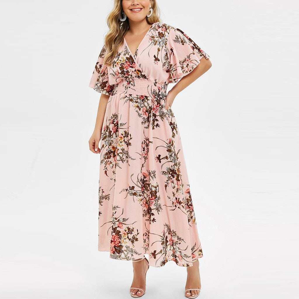 Vestido plus size floral da ROSIELARS em tecido leve com mangas largas e estampa vibrante