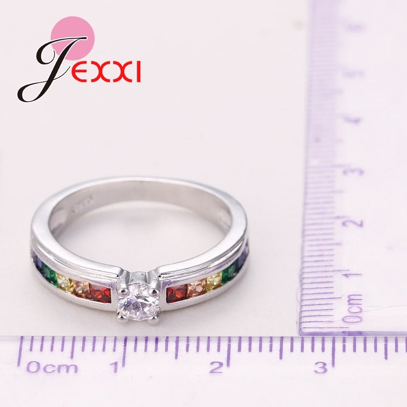 Anel de compromisso da JEXXI com pedras coloridas e diamante, ideal como joias de alta qualidade para noivado