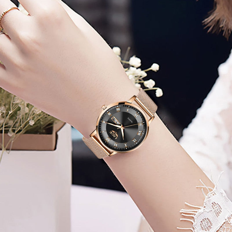 Relógio pulseira de malha feminino LIGE com mostrador preto e detalhes em dourado, perfeito para qualquer ocasião