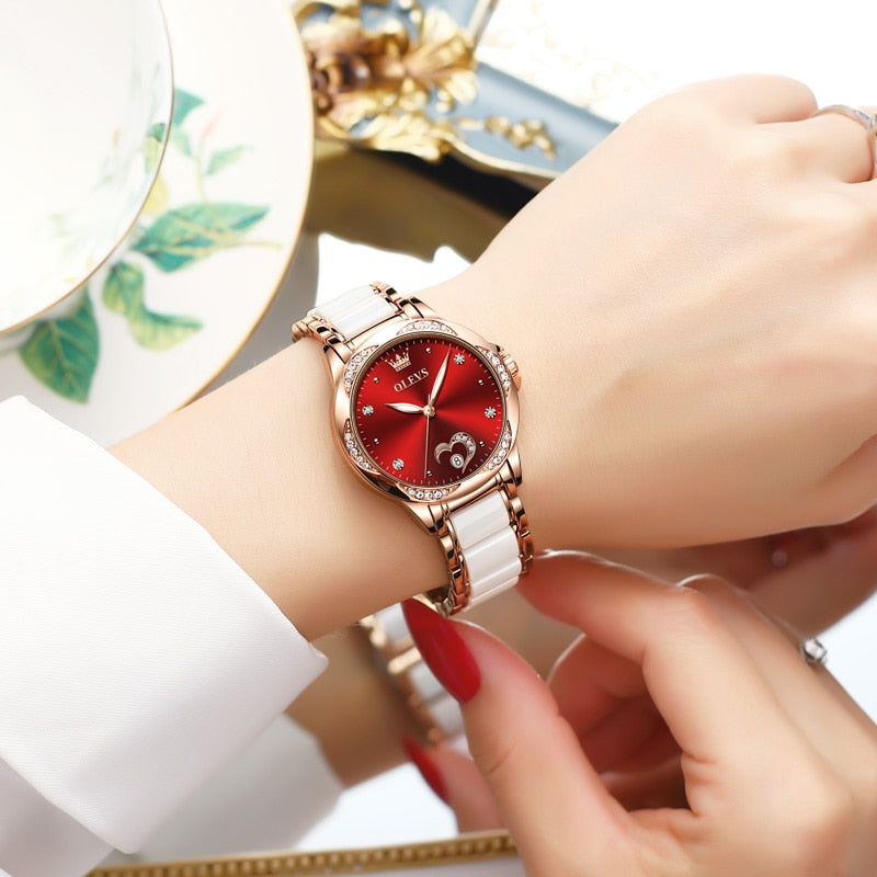 Relógio feminino automático OLEVS com mostrador vermelho e pulseira de metal elegante