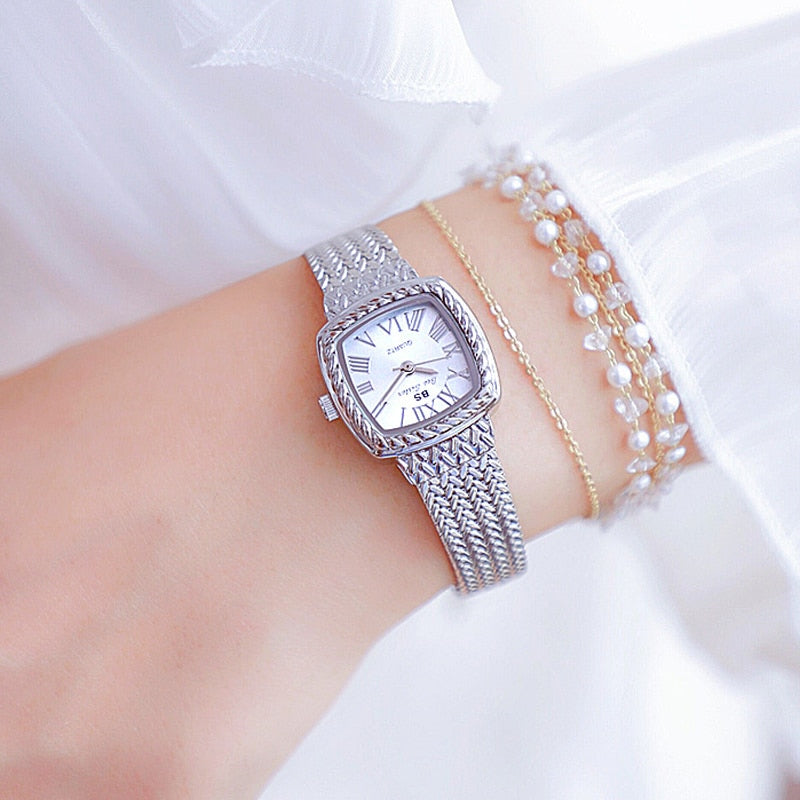 Relógio feminino dourado da BEE SISTER com design elegante e mostrador clássico