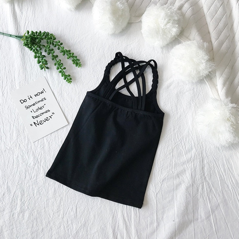 Camisola esportiva para meninas em preto com alças cruzadas para conforto e estilo