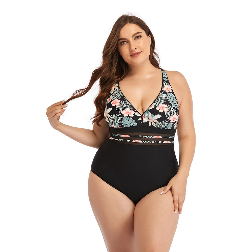 Maiô feminino plus size com estampa floral e recortes, ideal para usar como roupa de banho feminina plus size