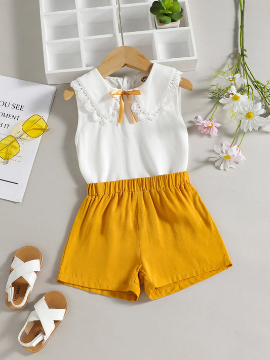 Conjunto infantil de menina, duas peças, primavera/verão, casua,l sem mangas, gola boneca, top com shorts amarelo