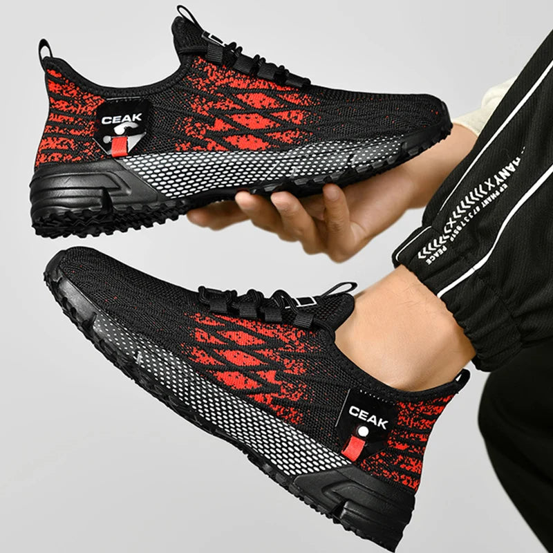 Tênis casual esportivo masculino moderno em preto e vermelho com design confortável e solado antiderrapante