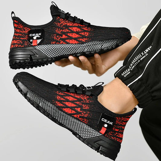 Tênis casual esportivo masculino moderno em preto e vermelho com design confortável e solado antiderrapante