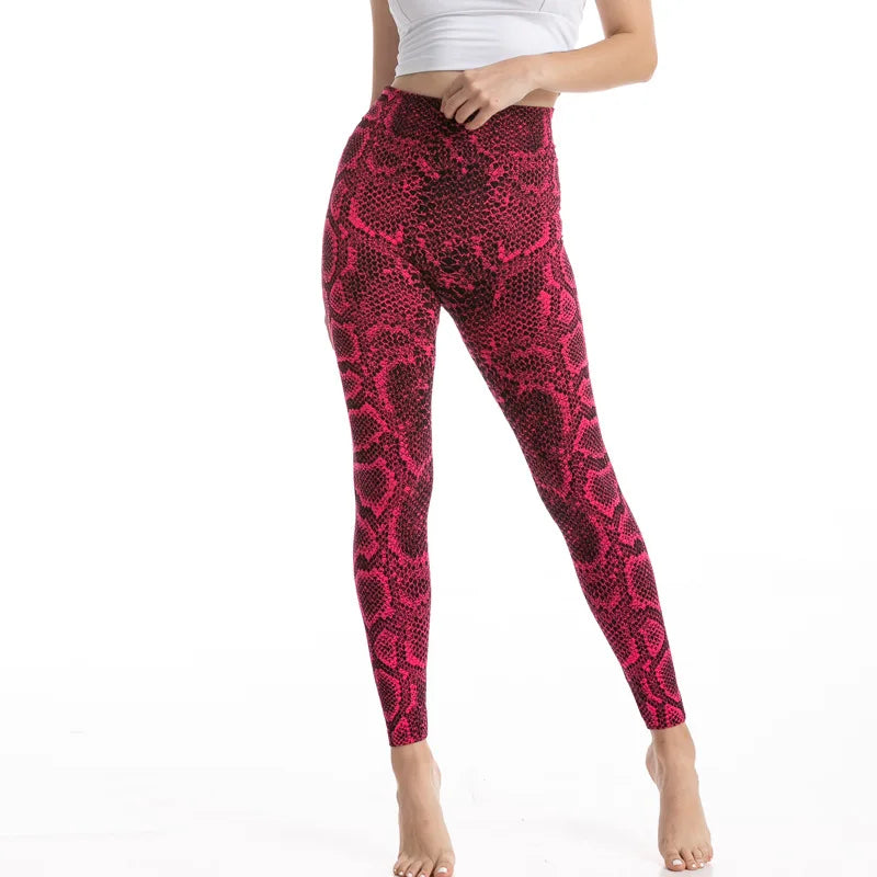Calça feminina legging workout estampa cobra em rosa, ideal para treino e atividades físicas