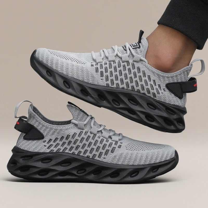 Tênis masculino DQTBE em cinza, ideal como sapato esportivo masculino 2025 com design moderno e conforto