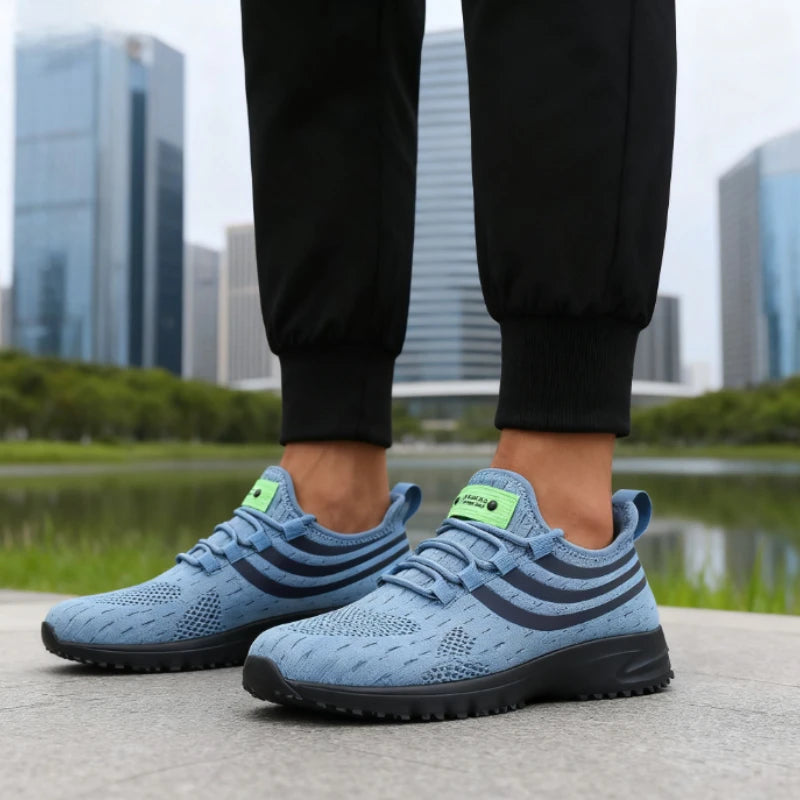 Sapatos de malha antiderrapante para homem em azul com design moderno, perfeitos para atividades ao ar livre.