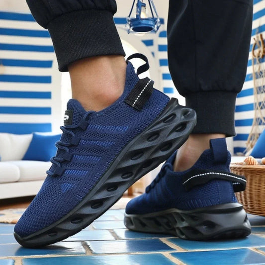 Tênis esportivo masculino absorção de impacto da BIG RUNNING em azul, ideal para corridas e treinos.