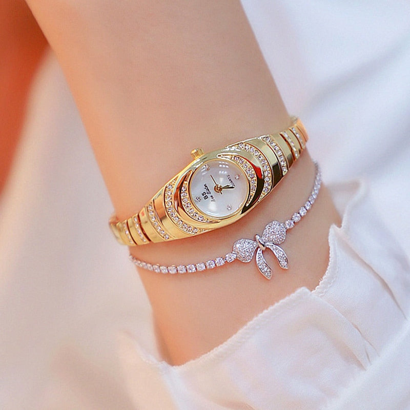 Relógio de aço inoxidável feminino BEE SISTER BS com design elegante e pulseira dourada, perfeito para qualquer ocasião